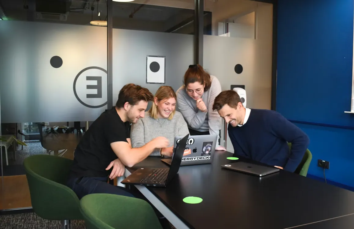 Technology professionals collaborating in a modern office